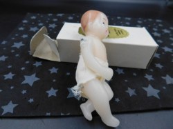 wax baby doll main side view